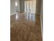 Bright living room featuring tile floors and sliding glass doors to the patio at 946 Lake Destiny Rd # D, Altamonte Springs, FL 32714