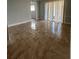 Bright living room featuring tile floors and sliding glass doors to the patio at 946 Lake Destiny Rd # D, Altamonte Springs, FL 32714
