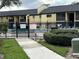 Community swimming pool area with a black metal fence and some signage at 946 Lake Destiny Rd # D, Altamonte Springs, FL 32714