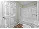 Bathroom featuring a bath, shower, and wood floor at 1343 Spring Lake Rd, Fruitland Park, FL 34731