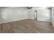Spacious living room featuring hardwood floors, neutral paint colors and open floor plan at 1343 Spring Lake Rd, Fruitland Park, FL 34731