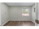 Neutral room with a window, new flooring and fresh paint at 1343 Spring Lake Rd, Fruitland Park, FL 34731