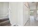 Bright hallway with tile flooring, closet, and natural light from the adjacent living area at 1412 Captiva Cv, Sanford, FL 32771