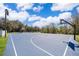 Community basketball court with lighting for evening games and beautiful sky at 1965 3Rd Dr, Sanford, FL 32771