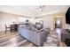Open concept layout with kitchen, dining area, and living space featuring modern finishes at 1965 3Rd Dr, Sanford, FL 32771