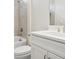 Modern bathroom featuring a sleek white vanity, quartz countertops, and a tiled shower-tub combination at 2120 Antilles Club Dr # 10, Kissimmee, FL 34747