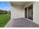 Covered patio with brick floor offers an area for outdoor living at 2120 Antilles Club Dr # 10, Kissimmee, FL 34747