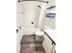 Clean bathroom featuring white tiled walls, new vanity, and modern fixtures at 2652 Graduate Ct, Orlando, FL 32826