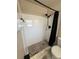 Shower area in bathroom with tile accents, and modern fixtures at 2652 Graduate Ct, Orlando, FL 32826