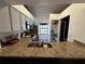 Modern kitchen featuring granite countertops, stainless steel appliances, and ample storage at 2652 Graduate Ct, Orlando, FL 32826
