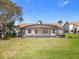 Spacious backyard showcases a screened pool, providing a private and enjoyable outdoor retreat at 2732 Lone Feather Dr, Orlando, FL 32837