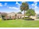 Charming single-story home featuring a well-manicured lawn, mature trees, and inviting curb appeal at 2732 Lone Feather Dr, Orlando, FL 32837