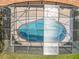 Top-down view of the screened pool with a red brick border and outdoor space at 2732 Lone Feather Dr, Orlando, FL 32837