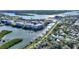 Exceptional aerial view of the property with waterfront access and amenities, surrounded by natural beauty at 3 Riverwalk Dr # 506, New Smyrna Beach, FL 32169