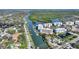 Aerial view of waterfront condos with boat docks and beautiful bay views at 3 Riverwalk Dr # 506, New Smyrna Beach, FL 32169