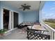 Inviting balcony with comfortable seating and a scenic view at 3 Riverwalk Dr # 506, New Smyrna Beach, FL 32169