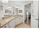Stylish bathroom with granite countertops, dual sinks, and modern fixtures at 3 Riverwalk Dr # 506, New Smyrna Beach, FL 32169
