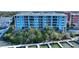 Condo building exterior with private balconies overlooking marina at 3 Riverwalk Dr # 506, New Smyrna Beach, FL 32169