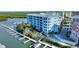 Waterfront condo building with private boat slips and easy access to the water, perfect for boating enthusiasts at 3 Riverwalk Dr # 506, New Smyrna Beach, FL 32169