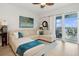 Comfortable living room with a large sectional sofa, soft rug, and a view to the patio at 3 Riverwalk Dr # 506, New Smyrna Beach, FL 32169