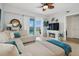 Cozy living room with a sectional sofa, fireplace, and a sliding glass door leading to the balcony at 3 Riverwalk Dr # 506, New Smyrna Beach, FL 32169