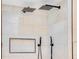 Walk-in shower featuring modern tile design, dual shower heads, and a built-in niche for toiletries at 303 Waterwood Dr, Yalaha, FL 34797