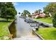 Waterfront community featuring a convenient boat launch and docking facilities at 303 Waterwood Dr, Yalaha, FL 34797