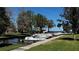 Waterfront property featuring a private boat dock and canal access for boating and watersport enthusiasts at 303 Waterwood Dr, Yalaha, FL 34797