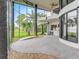 The sleek outdoor patio area is perfect for entertaining or relaxing with a surfboard on hand at 303 Waterwood Dr, Yalaha, FL 34797