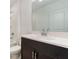 Modern bathroom featuring a vanity with dark brown cabinets at 3969 Southern Vista Loop, St Cloud, FL 34772