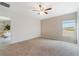 Bright bedroom with neutral carpet and plenty of natural light at 3969 Southern Vista Loop, St Cloud, FL 34772