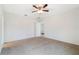 Spacious bedroom with neutral carpet and ceiling fan at 3969 Southern Vista Loop, St Cloud, FL 34772