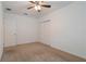 Neutral bedroom featuring carpet floors, a closet, and a ceiling fan at 3969 Southern Vista Loop, St Cloud, FL 34772