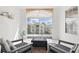 Relaxing balcony with outdoor seating and a view of the surrounding buildings, perfect for enjoying fresh air at 4849 Cypress Woods Dr # 1308, Orlando, FL 32811