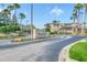 Welcoming entrance to SummerGate Condominiums with lush landscaping and clear signage, setting a pleasant tone at 4849 Cypress Woods Dr # 1308, Orlando, FL 32811