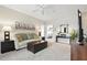 Relaxing living room with a comfortable sofa and a entertainment center at 4849 Cypress Woods Dr # 1308, Orlando, FL 32811