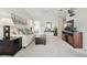 Inviting living room with a cozy sofa, entertainment center, and seamless access to other rooms at 4849 Cypress Woods Dr # 1308, Orlando, FL 32811
