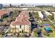 Aerial view of a well-maintained apartment complex with parking and recreational area at 5025 Shoreway Loop # 20503, Orlando, FL 32819