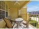 Cozy balcony with outdoor seating offering an inviting space to enjoy the community views at 5025 Shoreway Loop # 20503, Orlando, FL 32819