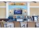 Stylish bar area at Vista Cay, featuring a wide selection of beverages, decorative lighting, and comfortable seating at 5025 Shoreway Loop # 20503, Orlando, FL 32819