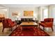 Comfortable living room featuring stylish seating, neutral walls, and a decorative area rug at 5025 Shoreway Loop # 20503, Orlando, FL 32819