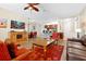Spacious living room showcasing an open floor plan with views of the kitchen and dining area at 5025 Shoreway Loop # 20503, Orlando, FL 32819