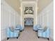 Elegant lobby area featuring comfortable seating and a view of a stylish chandelier at 5025 Shoreway Loop # 20503, Orlando, FL 32819