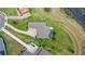 Stunning aerial perspective of a home with manicured lawn and a private pool at 534 Two Lakes Ln, Eustis, FL 32726