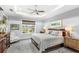 Tranquil bedroom with neutral color scheme and window view at 534 Two Lakes Ln, Eustis, FL 32726