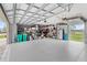 Spacious two car garage with epoxy flooring and plenty of room for storage at 534 Two Lakes Ln, Eustis, FL 32726