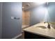 Bathroom featuring a single sink vanity and a tiled shower-tub combination at 535 Belle Fern Ct, Ocoee, FL 34761