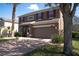 Beautiful home with a two-car garage, red shutters, and palm trees in the front yard at 535 Belle Fern Ct, Ocoee, FL 34761