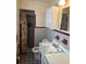 Vintage bathroom with gray and red tile and a shower at 5815 Holmes Dr, Orlando, FL 32808