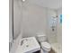 Bathroom featuring a shower, toilet, and vanity with a mirror at 5825 Hafer Ln, Orlando, FL 32808